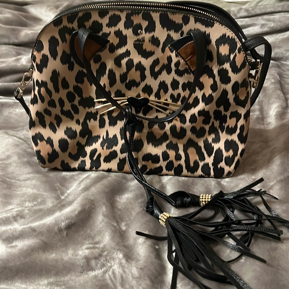 Kate Spade leopard cat purse with Crossbody strap two tassels